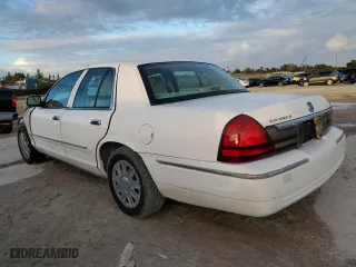 2006 Mercury Grand Marquis GS with VIN 2MEFM74V26X621309, listed as a Copart auction lot 76454214 with 59,171 mi miles and Salvage Title. Bid and sale history available at carsss.com. Image 2.