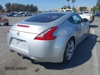 2010 Nissan 370Z Touring with VIN JN1AZ4EH6AM506591, listed as a IAAI auction lot 41838902 with 103,895 mi miles. Bid and sale history available at carsss.com. Image 4.