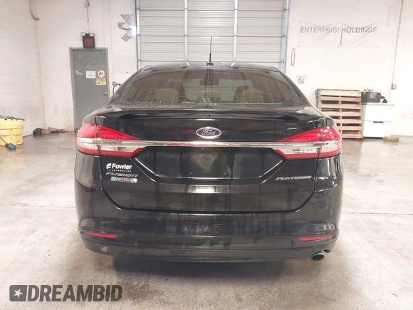 2017 Ford Fusion Titanium with VIN 3FA6P0SUXHR208653, listed as a IAAI auction lot 41312067 with 62,601 mi miles and . Bid and sale history available at DreamBid. Image 16.
