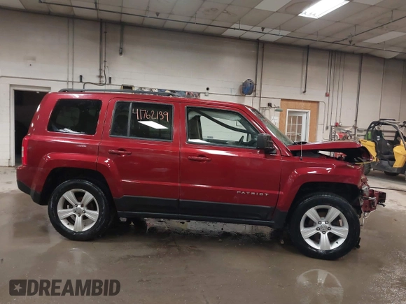 2014 Jeep Patriot Latitude with VIN 1C4NJRFB4ED884900, listed as a IAAI auction lot 41762139 with 131,635 mi miles and . Bid and sale history available at DreamBid. Image 14.