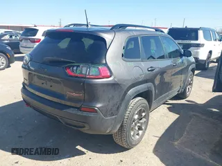 2022 Jeep Cherokee Trailhawk with VIN 1C4PJMBX4ND535037, listed as a IAAI auction lot 41779140 with 49,733 mi miles. Bid and sale history available at carsss.com. Image 4.