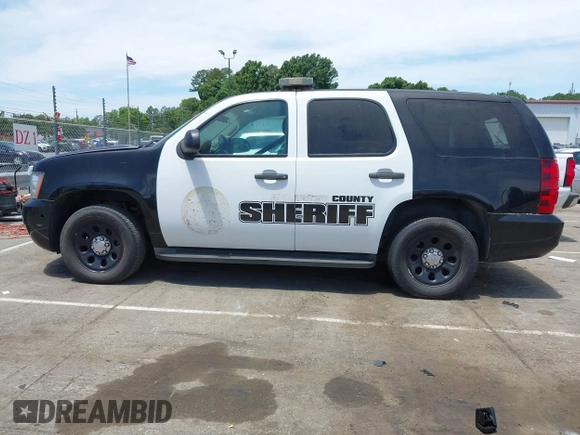 2013 Chevrolet Tahoe Commercial z VIN 1GNLC2E00DR337995, wystawiony jako IAAI lot #42213635 z przebiegiem Nie podano mil oraz . Historia ofert i sprzedaży dostępna na DreamBid. Obrazek 13.
