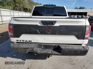 2023 Nissan Titan SV z VIN 1N6AA1ED7PN118575, wystawiony jako Copart lot #77127554 z przebiegiem 16 630 mil mil oraz Szkoda całkowita • Salvage title. Historia ofert i sprzedaży dostępna na DreamBid. Obrazek 6.