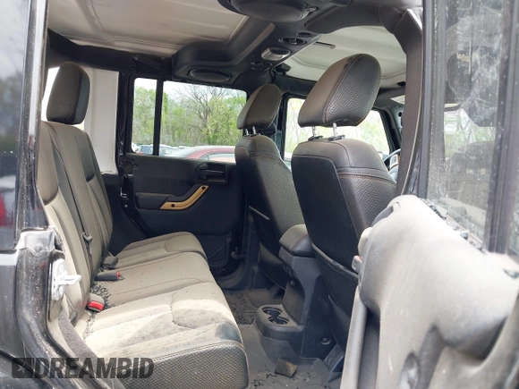 2014 Jeep Wrangler Unlimited Sahara with VIN 1C4BJWEG6EL189712, listed as a IAAI auction lot 42043053 with 108,716 mi miles. Bid and sale history available at carsss.com. Image 8.