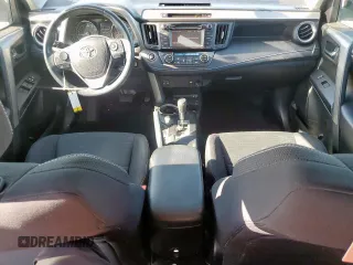 2018 Toyota RAV4 XLE with VIN 2T3WFREVXJW457073, listed as a Copart auction lot 62339635 with 75,321 mi miles and Salvage title. Bid and sale history available at DreamBid. Image 8.