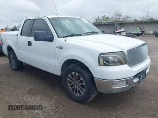 2004 Ford F-150 XLT with VIN 1FTRX12594KD71332, listed as a IAAI auction lot 42138488 with 170,234 mi miles. Bid and sale history available at carsss.com. Image 1.