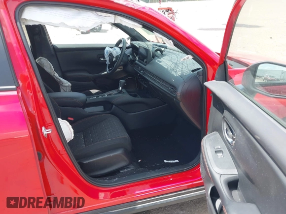 2024 Honda HR-V Sport z VIN 3CZRZ2H57RM785792, wystawiony jako IAAI lot #42273530 z przebiegiem 5 812 mil mil oraz . Historia ofert i sprzedaży dostępna na DreamBid. Obrazek 5.