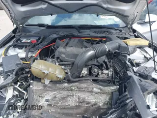 2016 Ford Mustang EcoBoost z VIN 1FA6P8TH5G5305096, wystawiony jako IAAI lot #41908211 z przebiegiem 106 585 mil mil oraz . Historia ofert i sprzedaży dostępna na DreamBid. Obrazek 10.