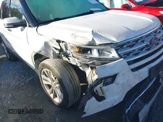 2019 Ford Explorer Limited z VIN 1FM5K7F82KGA03297, wystawiony jako IAAI lot #40847611 z przebiegiem 104 904 mil mil oraz . Historia ofert i sprzedaży dostępna na DreamBid. Obrazek 6.