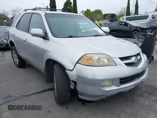 2005 Acura MDX Touring with VIN 2HNYD18955H558360, listed as a IAAI auction lot 41738503 with 153,461 mi miles. Bid and sale history available at carsss.com. Image 1.