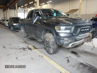 2020 Ram 1500 Rebel with VIN 1C6SRFLT0LN162491, listed as a IAAI auction lot 41841159 with 58,265 mi miles and . Bid and sale history available at DreamBid. Image 1.