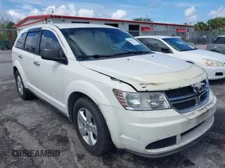 2013 Dodge Journey Canada Value z VIN 3C4PDCAB1DT646810, wystawiony jako IAAI lot #42484918 z przebiegiem 212 456 mil mil oraz . Historia ofert i sprzedaży dostępna na DreamBid. Obrazek 1.