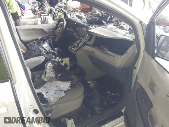 2017 Toyota Sienna LE with VIN 5TDJZ3DC5HS180200, listed as a IAAI auction lot 42204077 with 114,726 mi miles and . Bid and sale history available at DreamBid. Image 5.