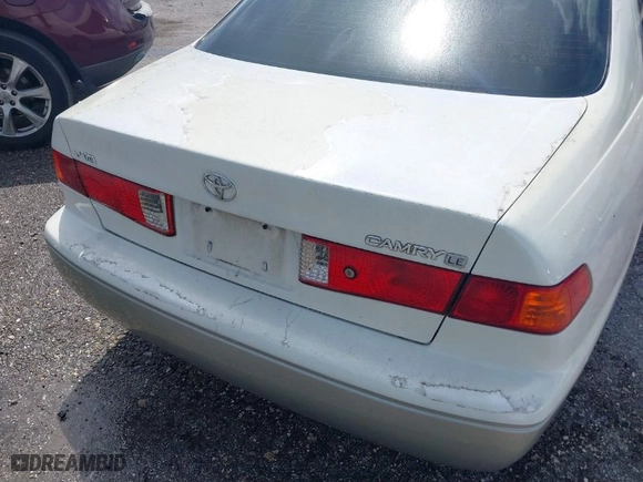 2001 Toyota Camry CE with VIN JT2BG22K710598404, listed as a IAAI auction lot 41806248 with 248,824 mi miles. Bid and sale history available at carsss.com. Image 12.