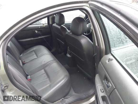 2003 Mercury Sable LS Premium with VIN 1MEFM55S13G612515, listed as a IAAI auction lot 41837589 with 62,173 mi miles and . Bid and sale history available at DreamBid. Image 8.