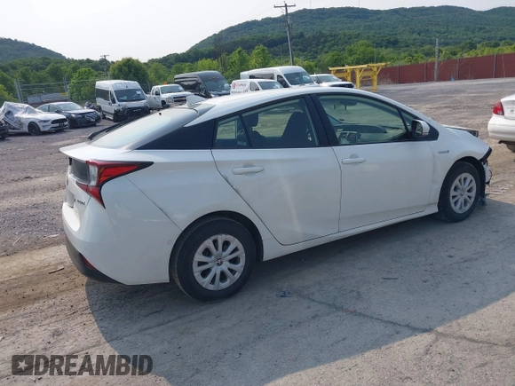 2021 Toyota Prius L Eco with VIN JTDKAMFU7M3147668, listed as a IAAI auction lot 42390394 with 80,831 mi miles and . Bid and sale history available at DreamBid. Image 4.