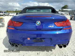 2012 BMW M6 z VIN WBSLZ9C5XCC985501, wystawiony jako Copart lot #78783464 z przebiegiem 80 961 mil mil oraz Czysty tytuł • Clean title. Historia ofert i sprzedaży dostępna na DreamBid. Obrazek 6.