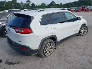 2018 Jeep Cherokee Latitude Plus z VIN 1C4PJLLX5JD511784, wystawiony jako IAAI lot #42361691 z przebiegiem 120 965 mil mil oraz . Historia ofert i sprzedaży dostępna na DreamBid. Obrazek 4.