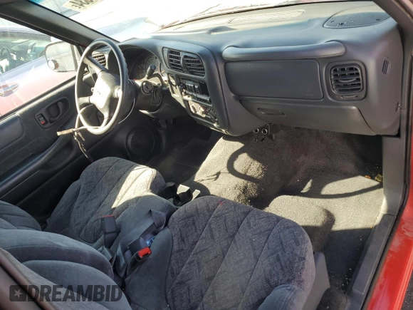 2000 GMC Sonoma SL z VIN 1GTCS145XYK251238, wystawiony jako Copart lot #77899534 z przebiegiem 61 827 mil mil oraz Szkody całkowita. Historia ofert i sprzedaży dostępna na DreamBid. Obrazek 8.