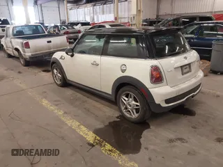 2009 MINI Hardtop S with VIN WMWMF73509TW85898, listed as a IAAI auction lot 41559954 with 97,186 mi miles and . Bid and sale history available at DreamBid. Image 3.