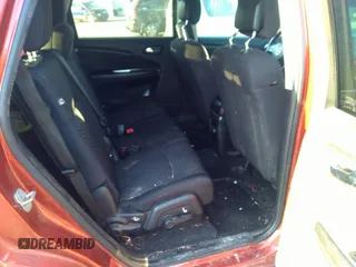 2013 Dodge Journey SXT with VIN 3C4PDCBG4DT659738, listed as a IAAI auction lot 41777689 with 165,050 mi miles. Bid and sale history available at carsss.com. Image 8.