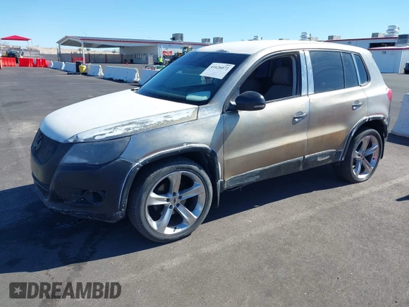 2010 Volkswagen Tiguan with VIN WVGAV9AX1AW513306, listed as a IAAI auction lot 41626072 with 162,086 mi miles and . Bid and sale history available at DreamBid. Image 2.