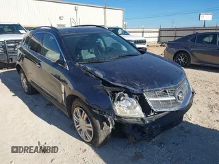 2010 Cadillac SRX z VIN 3GYFNGEY7AS503189, wystawiony jako IAAI lot #40927681 z przebiegiem 152 454 mil mil oraz . Historia ofert i sprzedaży dostępna na DreamBid. Obrazek 1.