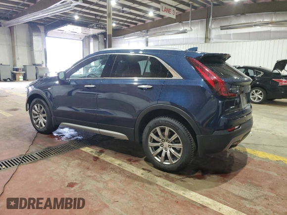 2021 Cadillac XT4 AWD Premium Luxury with VIN 1GYFZDR41MF031543, listed as a Copart auction lot 61085805 with 21,318 mi miles and Salvage title. Bid and sale history available at DreamBid. Image 2.