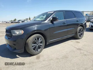 2012 Dodge Durango R/T with VIN 1C4SDHCT8CC148000, listed as a Copart auction lot 49520305 with 142,765 mi miles and Clean title. Bid and sale history available at DreamBid. Image 1.