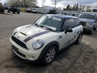 2009 MINI Hardtop S with VIN WMWMF73569TW84934, listed as a Copart auction lot 51344975 with 123,929 mi miles and Salvage title. Bid and sale history available at DreamBid. Image 1.