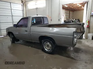 1987 Nissan Hardbody E z VIN JN6ND11S3HW057122, wystawiony jako Copart lot #73303004 z przebiegiem 233 309 mil mil oraz Szkody całkowita. Historia ofert i sprzedaży dostępna na DreamBid. Obrazek 2.