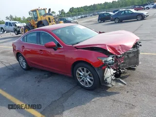 2016 Mazda 6 i Sport with VIN JM1GJ1U56G1409616, listed as a IAAI auction lot 42067647 with 158,180 mi miles and . Bid and sale history available at DreamBid. Image 1.
