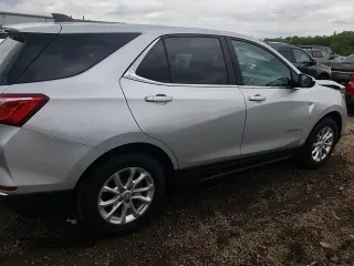 2021 Chevrolet Equinox LT z VIN 3GNAXKEV4MS101760, wystawiony jako Copart lot #57945775 z przebiegiem 162 125 mil mil oraz Szkoda całkowita • Salvage title. Historia ofert i sprzedaży dostępna na DreamBid. Obrazek 14.