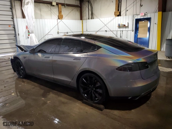 2015 Tesla Model S 85D with VIN 5YJSA1H26FF096308, listed as a Copart auction lot 82654054 with 113612 miles and Salvage Title. Bid and sale history available at carsss.com. Image 2.