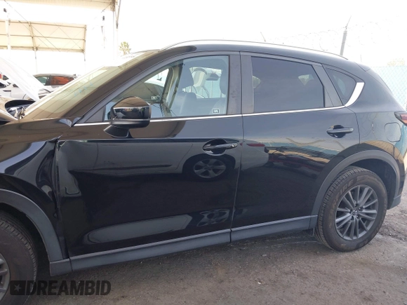2020 Mazda CX-5 Touring with VIN JM3KFACM0L0804998, listed as a IAAI auction lot 41850998 with 44,519 mi miles. Bid and sale history available at carsss.com. Image 14.