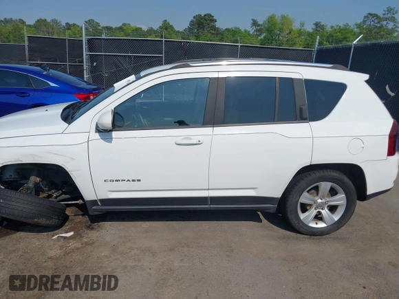 2014 Jeep Compass Latitude with VIN 1C4NJCEB7ED794428, listed as a IAAI auction lot 41995264 with 182,413 mi miles. Bid and sale history available at carsss.com. Image 15.
