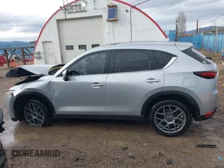 2018 Mazda CX-5 Grand Touring с VIN JM3KFBDM8J0326492, выставлен на аукционе IAAI как лот 40928841 с пробегом 114 848 миль миль и . История ставок и продаж доступна на DreamBid. Изображение 15.