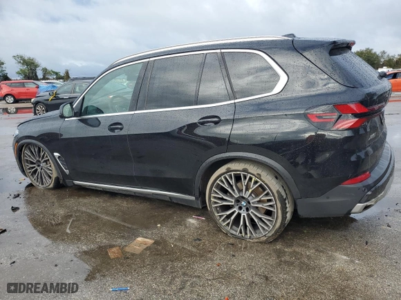 2024 BMW X5 xDrive40i with VIN 5UX23EU00R9U62752, listed as a Copart auction lot 85104184 with 23,547 mi miles and Salvage Title. Bid and sale history available at carsss.com. Image 2.