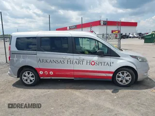 2015 Ford Transit Connect XLT z VIN NM0GE9F77F1203430, wystawiony jako IAAI lot #42700533 z przebiegiem 107 902 mil mil oraz . Historia ofert i sprzedaży dostępna na DreamBid. Obrazek 13.