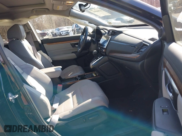 2020 Honda CR-V Touring with VIN 2HKRW2H98LH626651, listed as a IAAI auction lot 41668951 with 64,391 mi miles and . Bid and sale history available at DreamBid. Image 5.