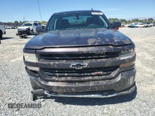 2016 Chevrolet Silverado 1500 LT with VIN 3GCUKREC1GG138154, listed as a Copart auction lot 49115035 with 147,854 mi miles and Salvage Title. Bid and sale history available at DreamBid. Image 5.