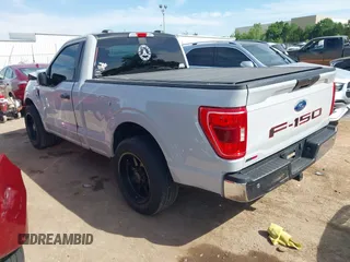 2023 Ford F-150 XL with VIN 1FTMF1C53PKF34184, listed as a IAAI auction lot 42242703 with 27,312 mi miles and . Bid and sale history available at DreamBid. Image 3.