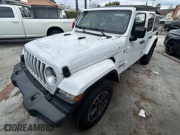 2023 Jeep Wrangler Sahara with VIN 1C4HJXENXPW586579, listed as a IAAI auction lot 41795621 with 34,433 mi miles. Bid and sale history available at carsss.com. Image 2.