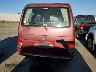2003 Volkswagen EuroVan MV с VIN WV2NB47013H001081, выставлен на аукционе Copart как лот 82126354 с пробегом 158 433 миль миль и Чистый • Clean title. История ставок и продаж доступна на DreamBid. Изображение 6.