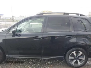 2017 Subaru Forester Premium with VIN JF2SJAEC5HH518988, listed as a IAAI auction lot 42019312 with 109,358 mi miles. Bid and sale history available at carsss.com. Image 14.