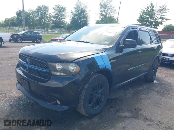 2013 Dodge Durango Crew with VIN 1C4RDJDG8DC675558, listed as a IAAI auction lot 42466777 with 160,407 mi miles and . Bid and sale history available at DreamBid. Image 17.
