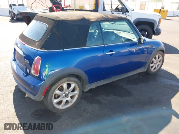 2007 MINI Convertible with VIN WMWRF33507TG16644, listed as a IAAI auction lot 40058098 with 163,215 mi miles and . Bid and sale history available at DreamBid. Image 4.