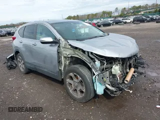 2018 Honda CR-V EX with VIN 7FARW2H51JE043660, listed as a IAAI auction lot 41952272 with 58,536 mi miles and . Bid and sale history available at carsss.com. Image 1.