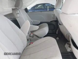 2014 Toyota Sienna LE AAS with VIN 5TDKK3DC4ES505293, listed as a IAAI auction lot 42021409 with 70,319 mi miles. Bid and sale history available at carsss.com. Image 8.