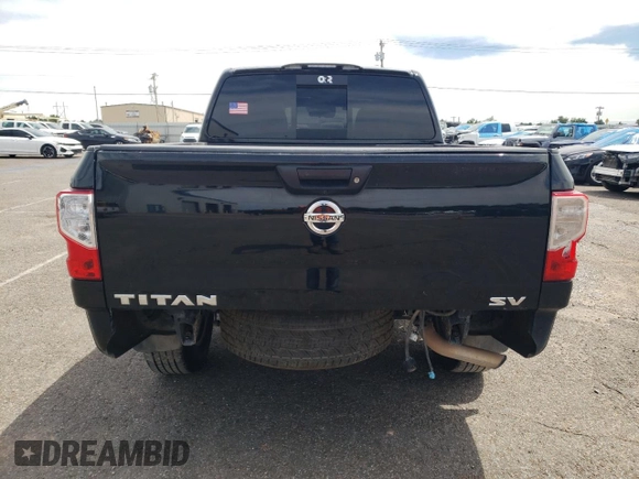 2021 Nissan Titan SV with VIN 1N6AA1EE2MN528429, listed as a Copart auction lot 56388524 with 93,353 mi miles and Salvage Title. Bid and sale history available at DreamBid. Image 6.